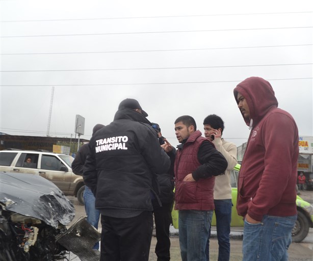 Otro accidente porpavimento mojado