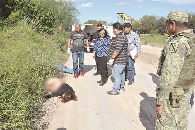 Hallan mujer asesinada