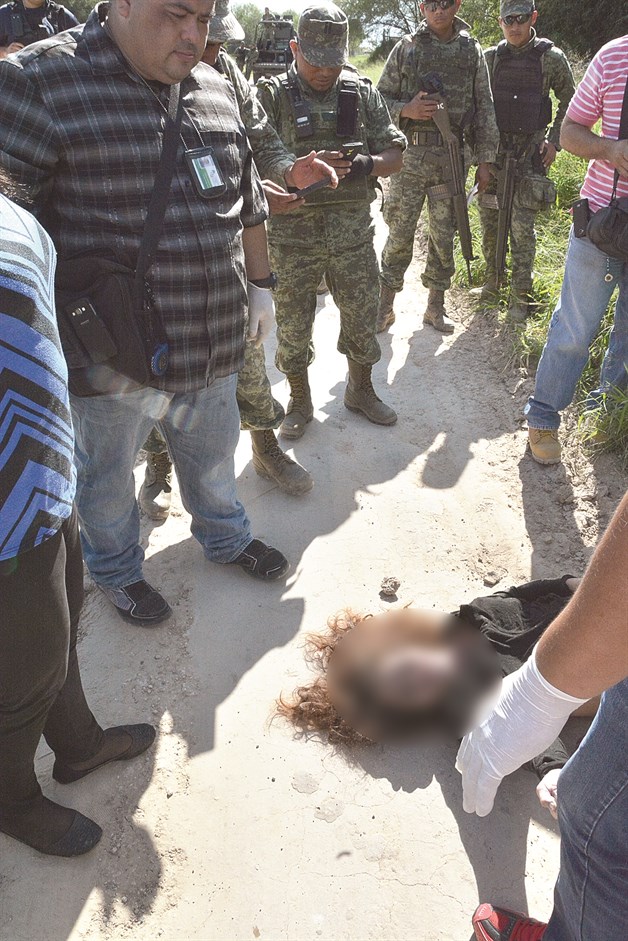 Hallan mujer asesinada