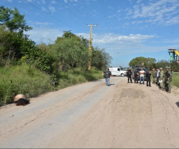 Hallan mujer asesinada Hallan mujer asesinada