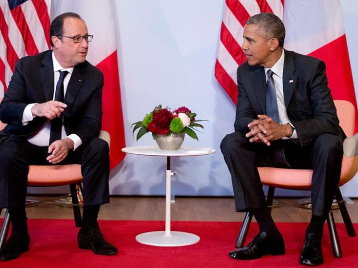 Hollande y Obama rinden homenaje a víctimas Hollande y Obama rinden homenaje a víctimas