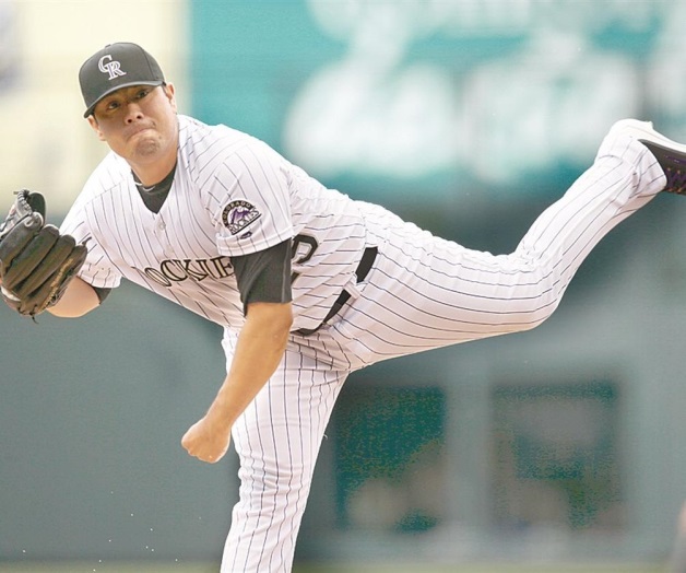 Rockies y De la Rosa ganan