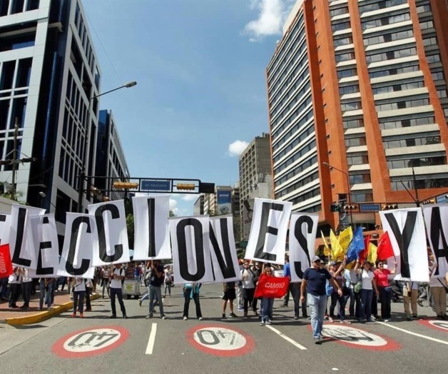Exigen con marcha elecciones en Venezuela
