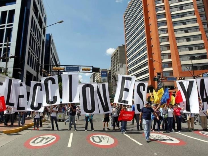 Exigen con marcha elecciones en Venezuela Exigen con marcha elecciones en Venezuela