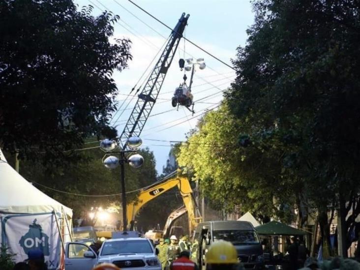 Autoridades usan maquinaria en edificio pese a reclamos Autoridades usan maquinaria en edificio pese a reclamos