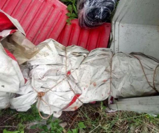 Arrojan mutilado junto a una hielera