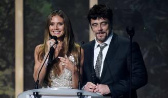 PRESENTADORES. La modelo Heidi Klum y el actor Benicio del Toro.