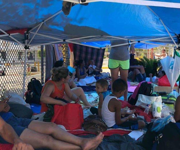 MATAMOROS: Bajo un sol abrasador esperan anuencia de EU MATAMOROS: Bajo un sol abrasador esperan anuencia de EU