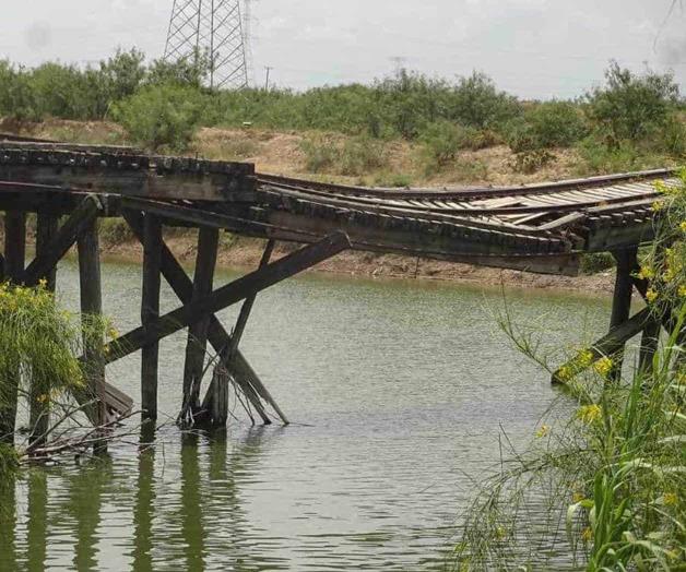 Puente aún en pie de milagro. Vetusta estructura pende de un hilo Puente aún en pie de milagro. Vetusta estructura pende de un hilo