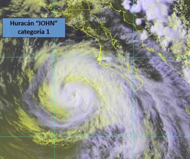 Huracán John se degrada a categoría 1 Huracán John se degrada a categoría 1