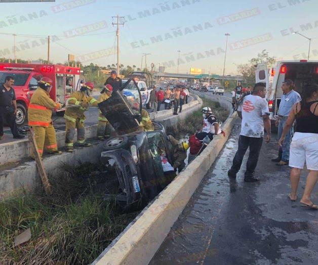 “Atrapada” entre los fierros “Atrapada” entre los fierros