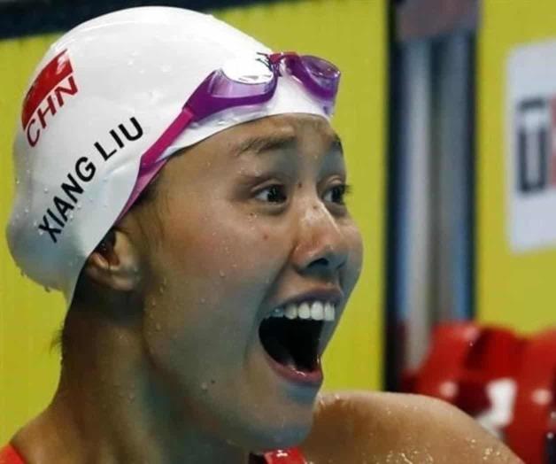 La china Liu Xiang bate el récord del mundo de 50 dorso La china Liu Xiang bate el récord del mundo de 50 dorso