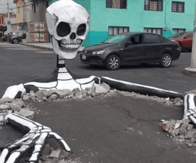 Calaveras rompen pavimento en Tláhuac por Día de Muertos