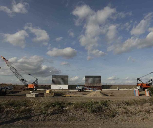 Grupo privado construye muro Grupo privado construye muro