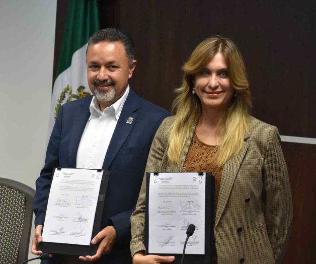 Firman convenio municipio y AMIC