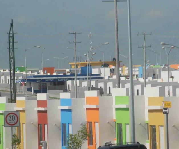Exhortan a pagar predial por casas de interés social
