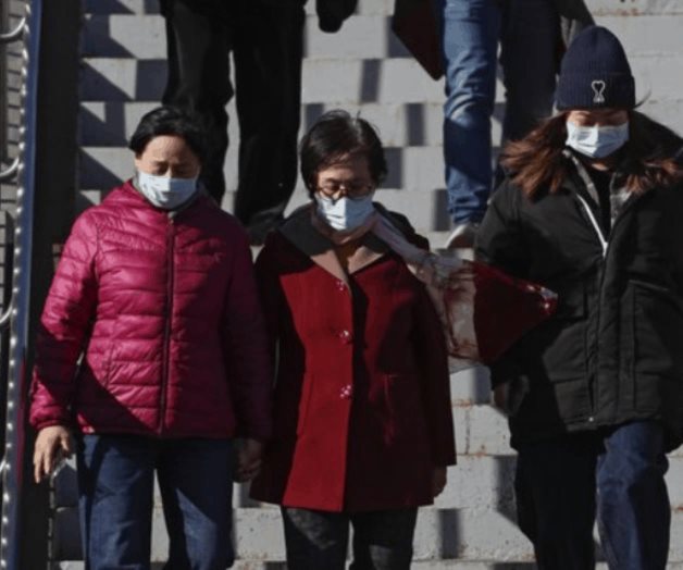 China insta a su reacia población a vacunarse