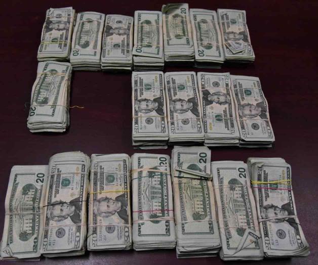 Cae pareja con 91 mil 116 dólares