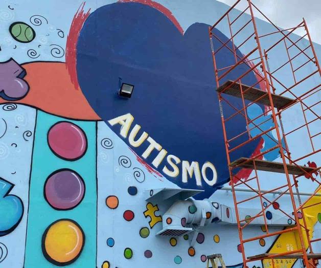 Pintan mural en honor a personas con autismo
