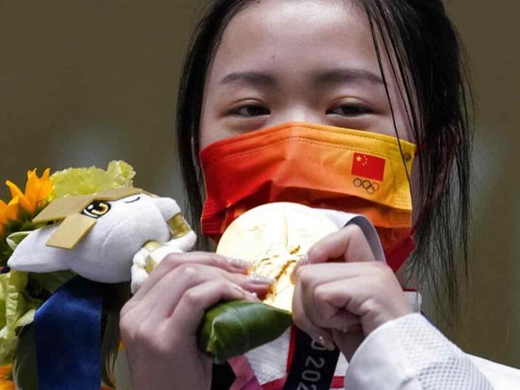 Calor, política, virus y medallas en primer día de Tokio Calor, política, virus y medallas en primer día de Tokio