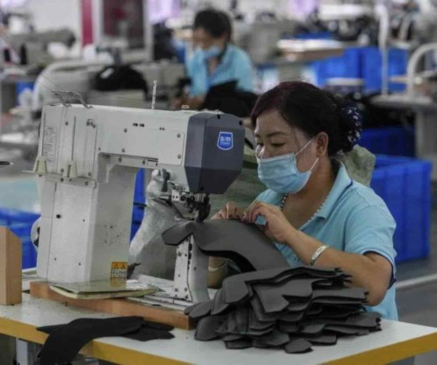 Crecimiento de China se ralentizará por inundaciones y COVID