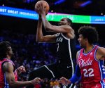 Durant logra ´triple doble´ y Nets gana