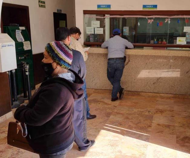 Invitan a contribuyentes a pagar impuesto predial