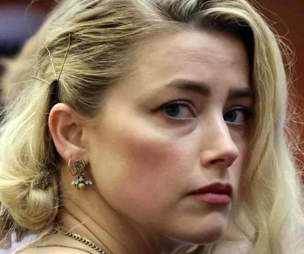 Se niega aseguradora a pagar deudas de Amber Heard