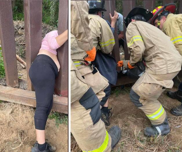 Mujer queda atrapada en el muro fronterizo Mujer queda atrapada en el muro fronterizo