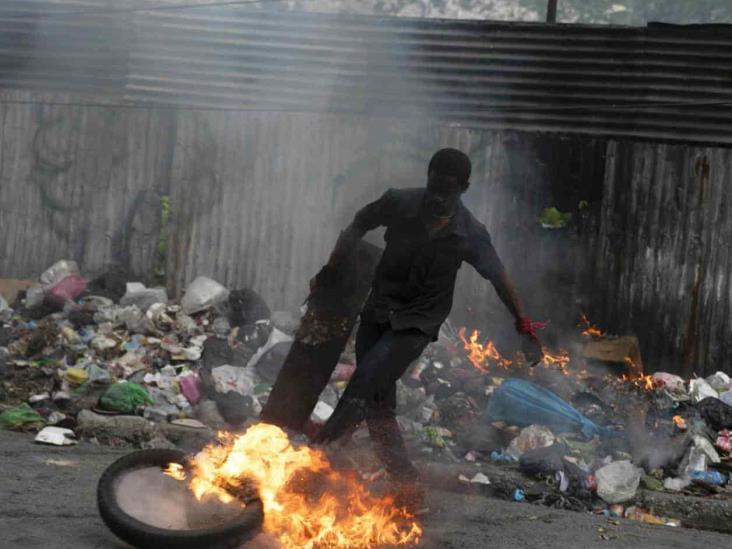 Miles de manifestantes haitianos exigen la dimisión de Henry Miles de manifestantes haitianos exigen la dimisión de Henry