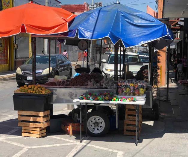 Logran vendedores ambulantes acuerdo en pago de permisos