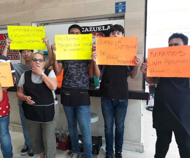 Protestan locatarios