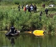 REYNOSA | Localizan persona en el interior del taxi que cayó al canal Anzaldúas