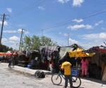 Crean migrantes tianguis haitiano