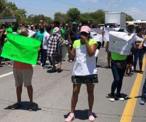 Familiares de desaparecidos bloquean carretera Matamoros-Victoria