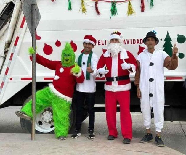 Recolectan basura Santa y El Grinch