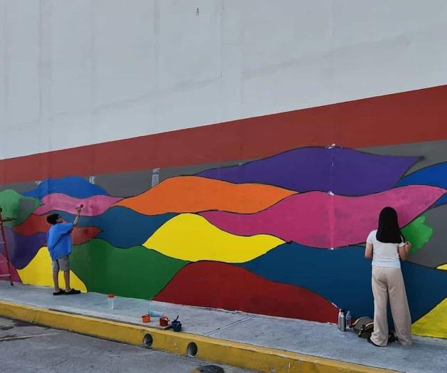 Restauran mural en honor a niños autistas Restauran mural en honor a niños autistas