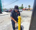 De un ducto de combustible:Surge fuga de gas cerca de pizzería