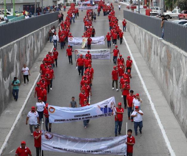Desfile del Día del Trabajo en Reynosa: Exigen obreros mejores condiciones Desfile del Día del Trabajo en Reynosa: Exigen obreros mejores condiciones