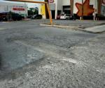 Reaparecen baches en la carretera a Río Bravo