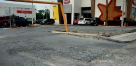 Reaparecen baches en la carretera a Río Bravo