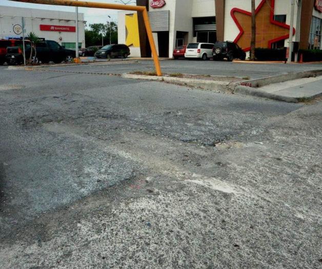 Reaparecen baches en la carretera a Río Bravo Reaparecen baches en la carretera a Río Bravo