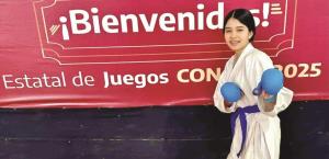 Va Nahomi Elizabeth por una medalla