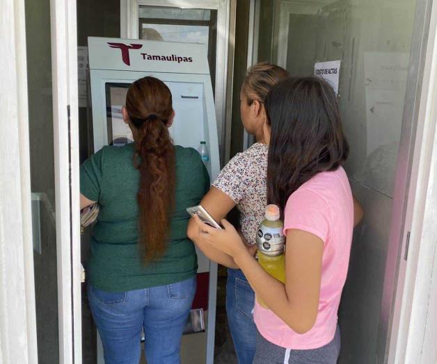 Filas en el cajero del Registro Civil