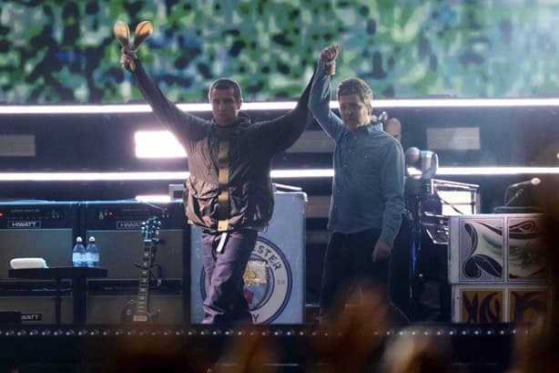 Gallagher brothers on stage