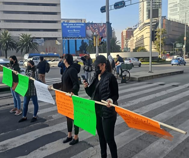 Tras 7 horas de protestas, trabajadores del SAT liberan vialidades Tras 7 horas de protestas, trabajadores del SAT liberan vialidades