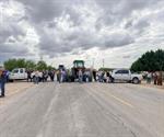 Productores levantan bloqueos carreteros
